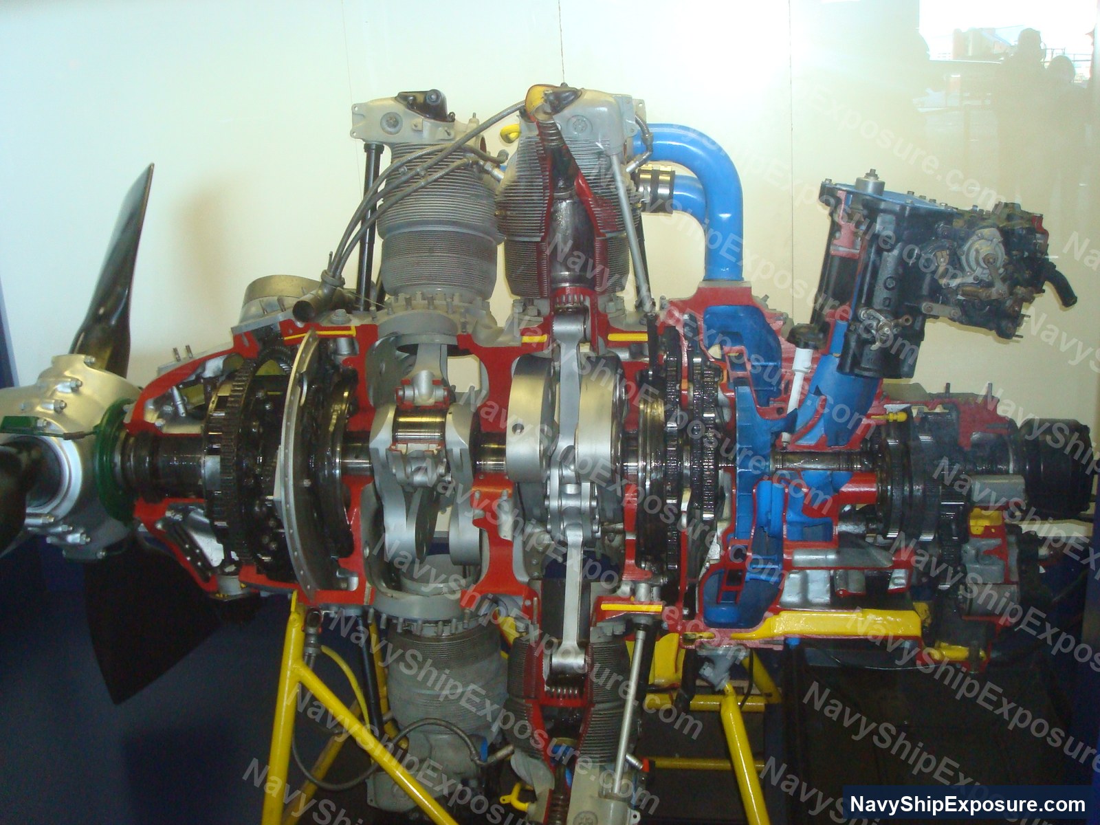 USS Midway — Cutaway model or display of a naval aircraft carrier propulsion system showing turbine, reduction gear, and engine components typical of USS Midway-class carriers from the WWII/Cold War era.